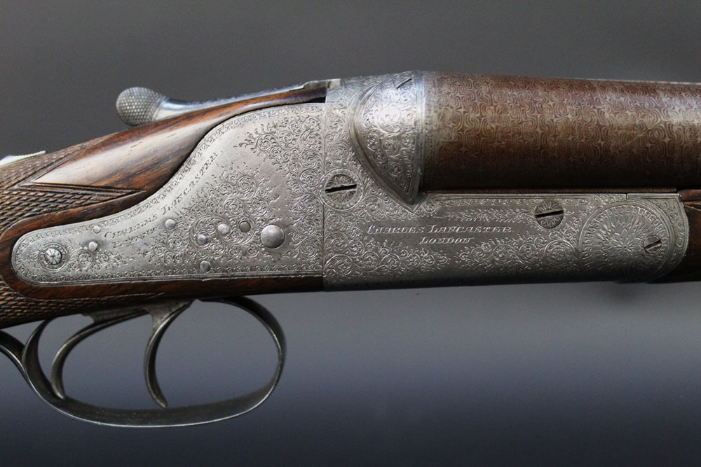 Charles Lancaster a 12 bore Patent hammerless ejector gun, with 30" Damascus barrels, - Image 10 of 16