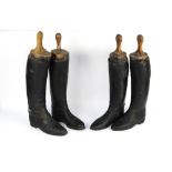 A pair and two single vintage fox hunting leather boots,