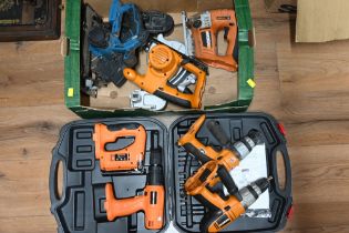 Box of power tools including Worx, hammer drill, circular saw, jigsaw,