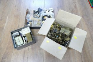 Three boxes of clock and watch parts