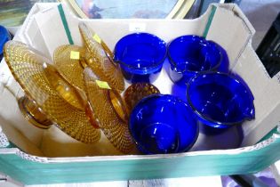 Four blue glass rinsing bowls and amber glass bowls