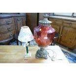 Electric lamp with red glass shade, styled as an oil lantern, 60 cm high,