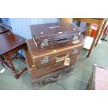 Four vintage leather suitcases, largest 66 cm long, 37 cm wide,