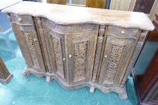 Heavily carved ornate hardwood sideboard, height 82 cm,