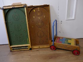 Triang baby walker and two bagatelle boards by Chad Valley and Kay of London