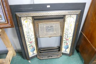 Vintage fireplace with floral tiled inset