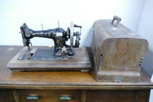 Federation hand sewing machine in wooden case