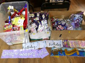 Three boxes of children's party ware, badges, banners, balloons, candles,