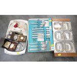 Boxed set of stainless steel cutlery, stainless steel trays,