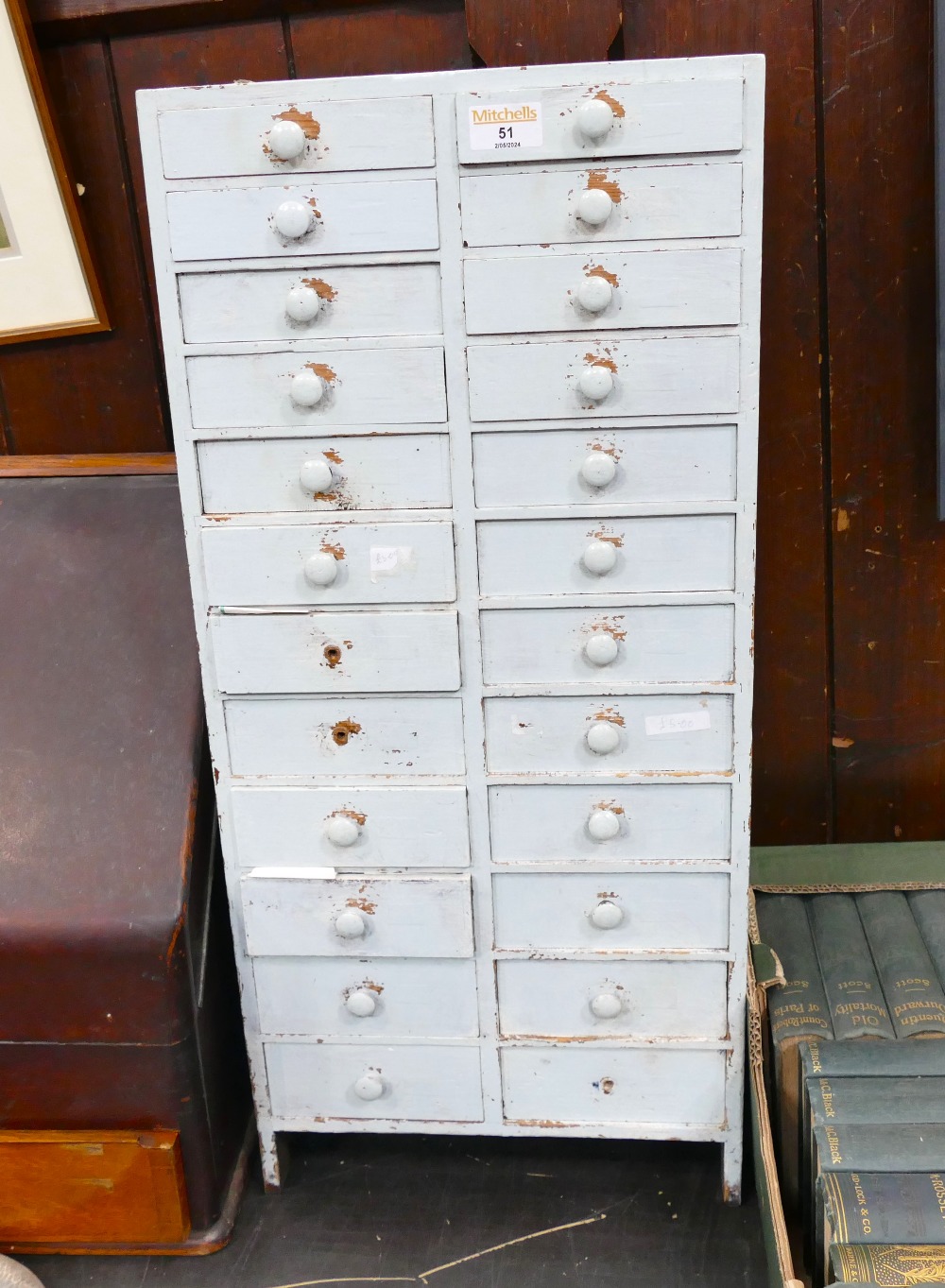 Late 19th century set of graduated drawers containing watch parts and spares, height 67 cm,
