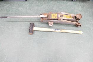 Metal trolley jack and hickory shafted sledgehammer