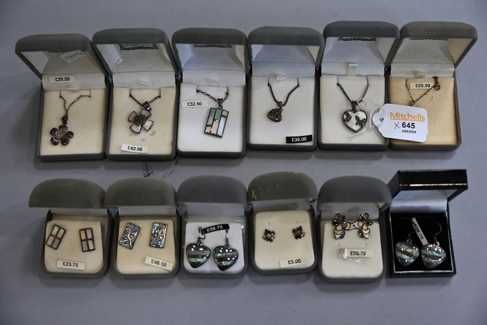 Silver chains with pendants,
