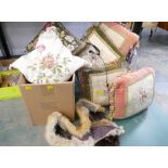 Bag and box of decorative cushions