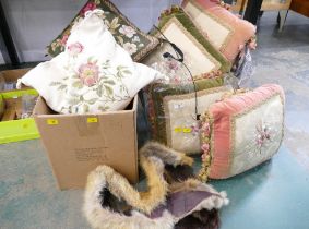 Bag and box of decorative cushions