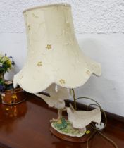 Decorative table lamp with shade, with bird ornament base,