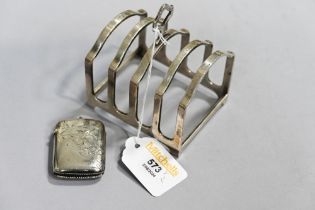 Silver toast rack and Vesta case,