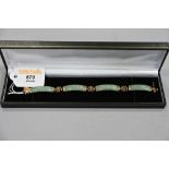 Chinese 18 ct gold and jade bracelet