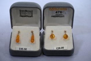 Two pairs of 9 ct gold and amber earrings