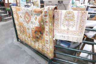 Small rectangular silk rug with singular tasselled end, 80 x 46.