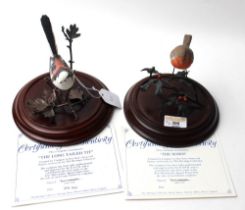 Two Heritage Collection bird figures, with certificates,