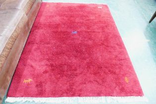 Red fluffy rug with tasselled edges, length 200 cm,