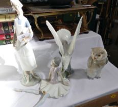 Four Lladro and Nao figurines