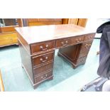 Red leather tooled leather top reproduction pedestal desk