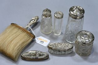 Silver topped dressing table bottles,