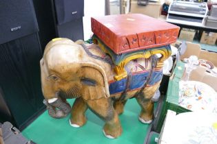 Carved wooden elephant plant stand