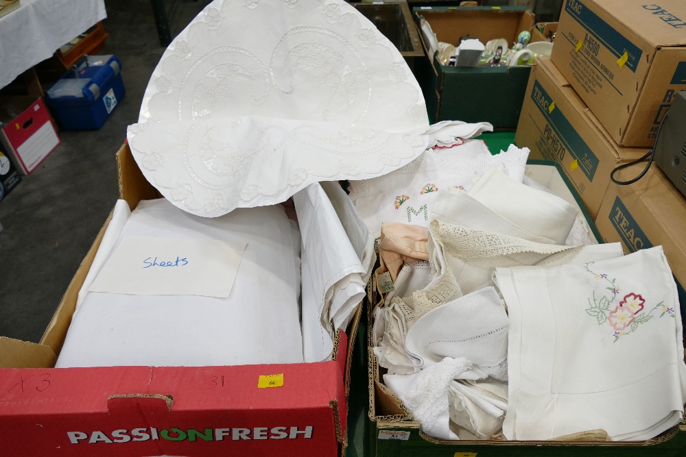 Three boxes of linen, sheets, tablecloths,
