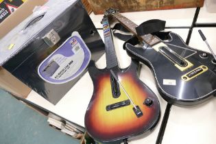 Two Guitar Hero guitars and A4 metal file box