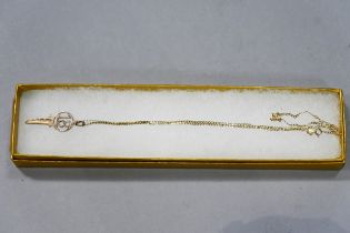 9 ct gold chain with 18 key pendant