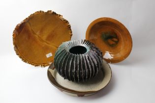 Four pieces of Studio Pottery, dish marked to underside Caleb 1/76, diameter 34.