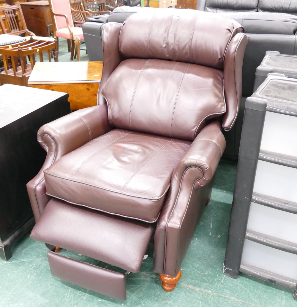 Modern brown leather wing backed reclining armchair