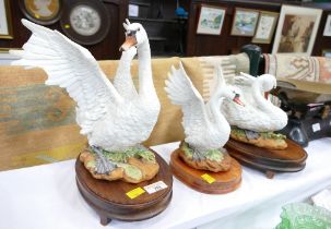 Three Kowa swan figurines