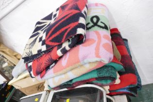 Large collection of blankets and rugs