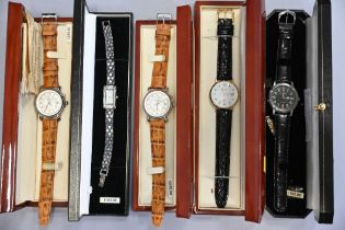 Five boxed wristwatches