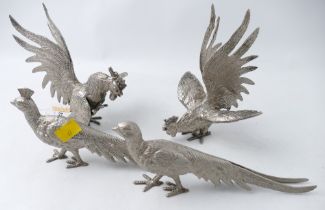 Four metal statues of fighting cocks and pheasants,