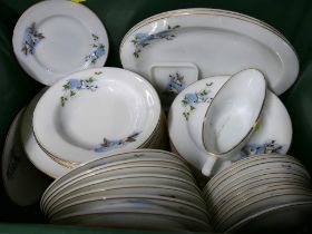 Box of Jaj glass dinner service decorated with flying ducks