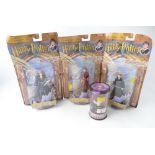 Four Harry Potter figures boxed, Hermione, Ron,