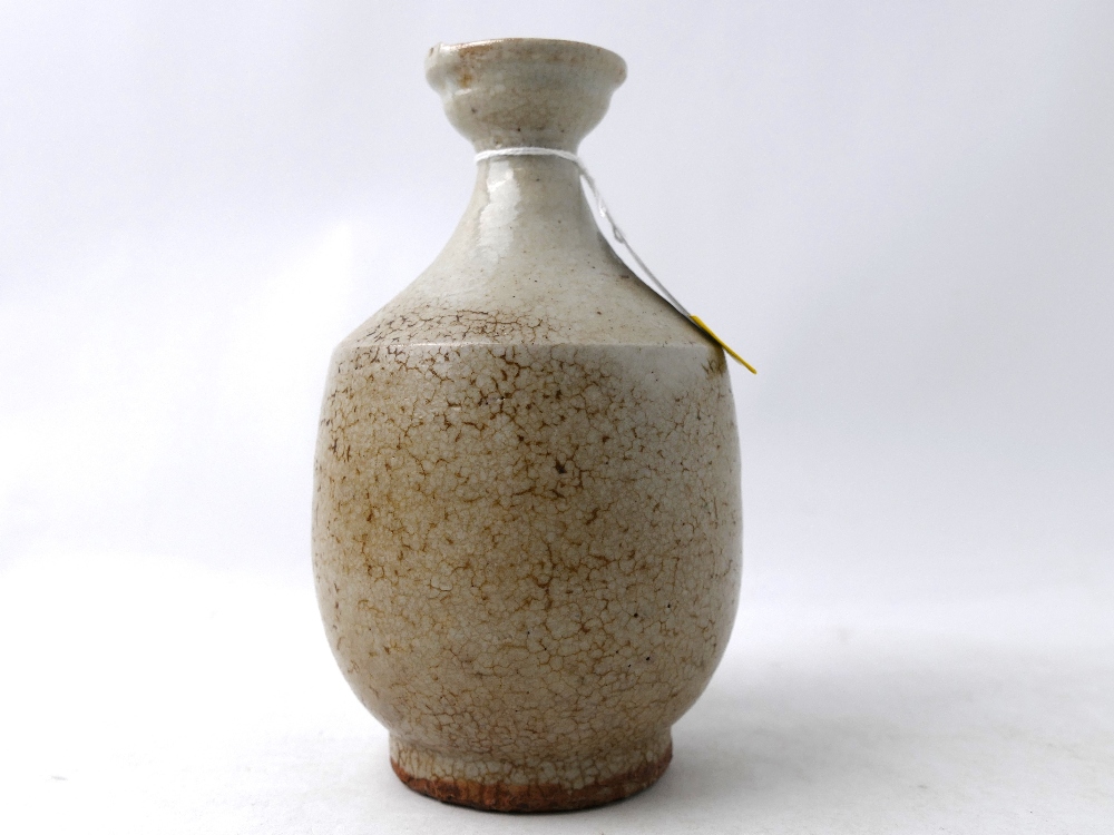 Small oriental brown crackle glazed Studio Pottery vase,