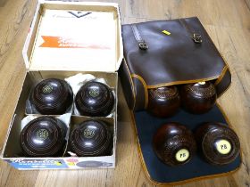 Boxed set of Henselite Super Grip bowls and bag of four wooden bowls marked PB