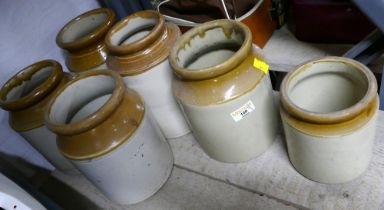 Six stoneware utensil jars