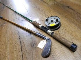 Vintage green fishing rod with Strike Right reel and wooden shaft golf club with A.G.
