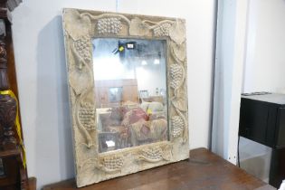 Wall mirror with substantial carved wooden frame,
