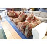 Substantial red and gold floral upholstered settee,