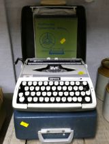 Cased Zephyr typewriter,