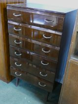 Unusual veneered 6 flight chest of mid century drawers