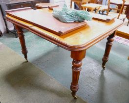 Victorian extending dining table with two leaves