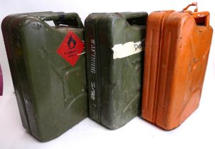 Three 20 L metal Jerry cans, two green,